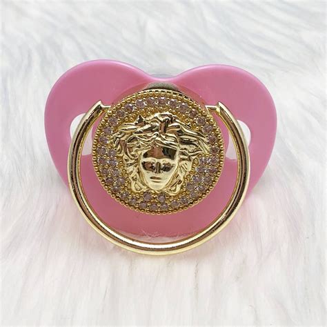 pink versace pacifier